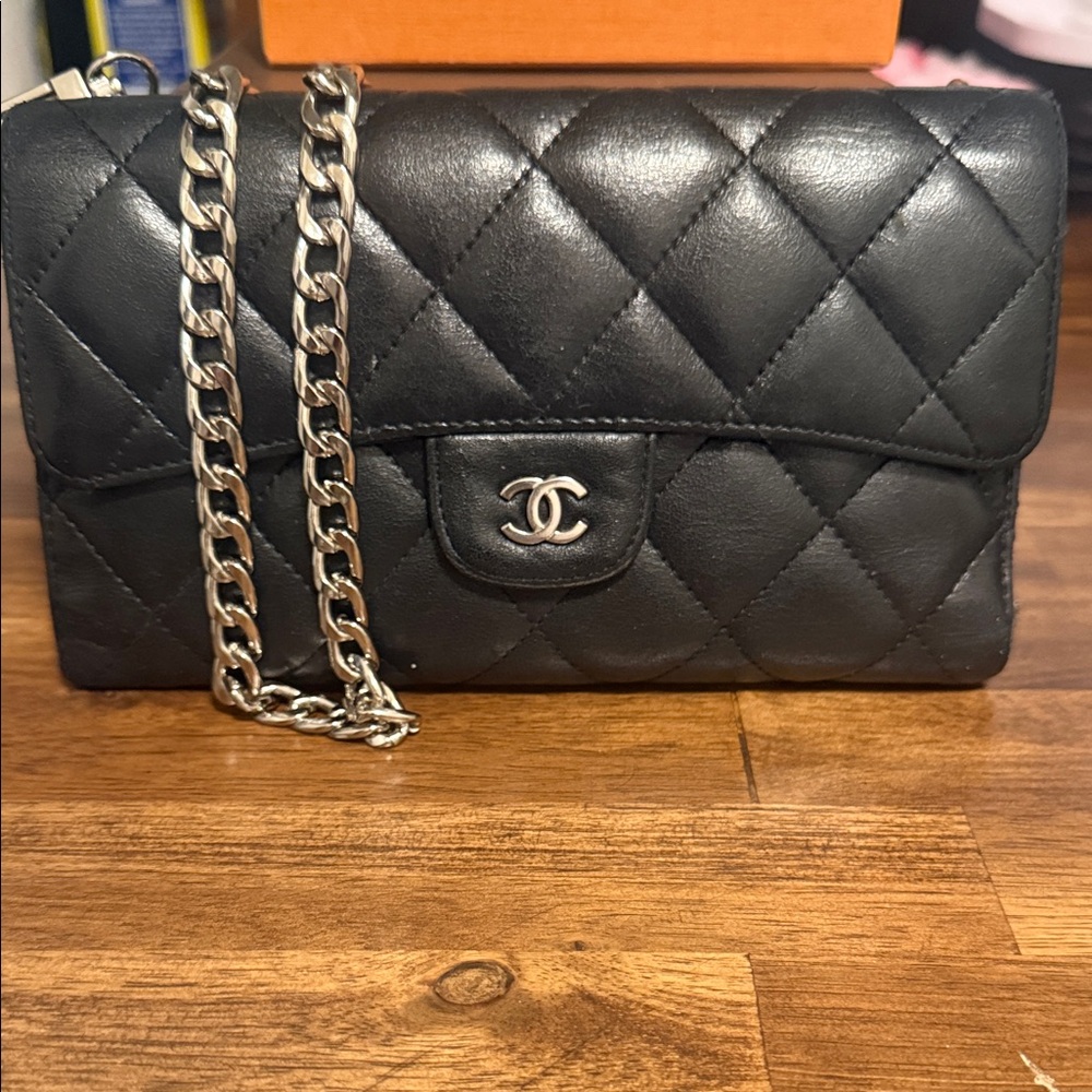 CHANEL Black Quilted wallet on Chain